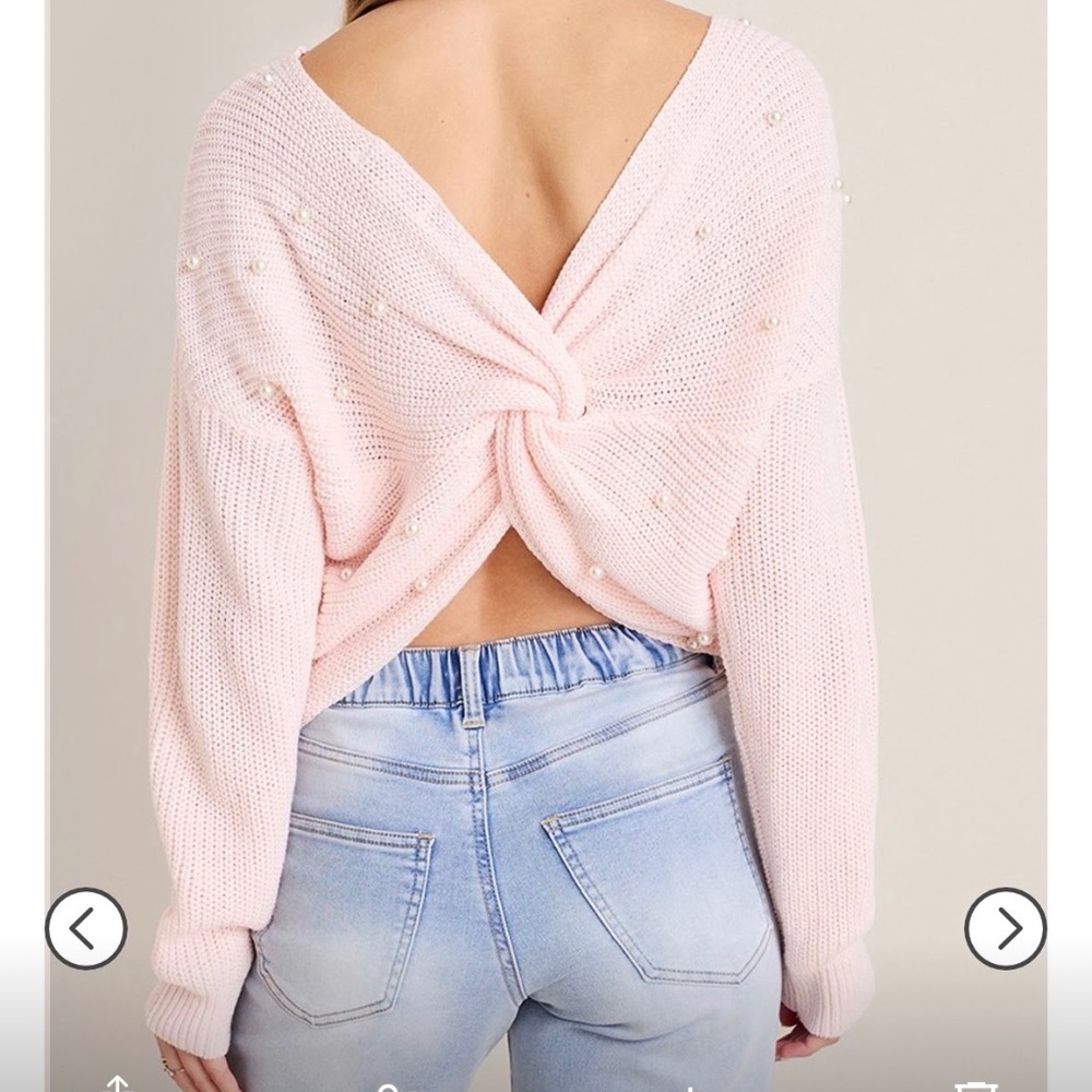 Francesca’s light pink beaded twist back sweater